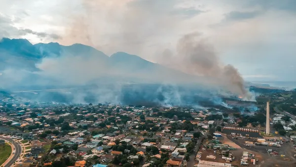 Aerial view of Lahainaluna neighborhood with smoke from fires in Maui, Hawaii.