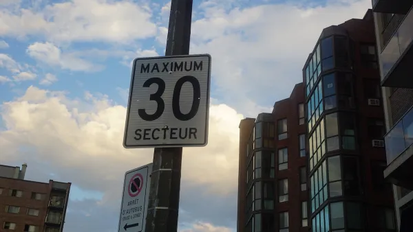 Close-up of "Maximum 30 Secteur" speed limit sign on pot in Quebec, Canada.