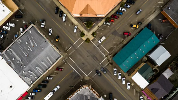 Aerial view of strip mall with diagonal parking spots in Coquille, Oregon