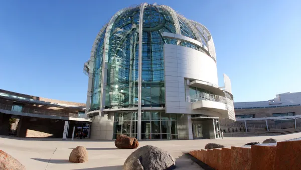 Glass dome at front of modern San Jose City Hall building in San Jose, California.