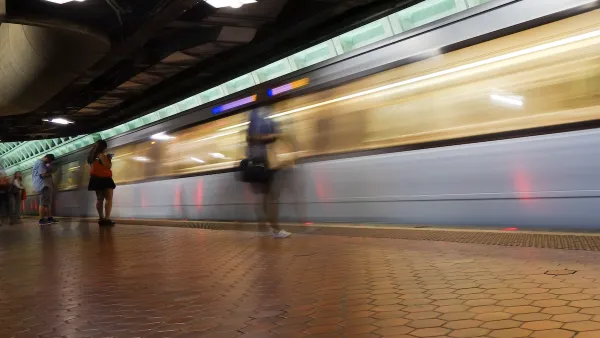 Blurred train in motion passing through underground station in Washington, D.C.