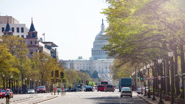 View down Pennsylvania Avenue with U.S. capitol in background and bike lane in middle of street