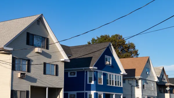 Row of two-story traditional wood houses in Stamford, Connecticut