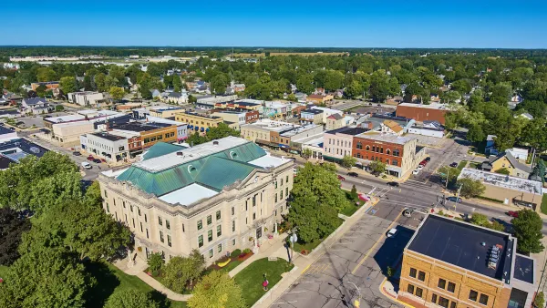 Aerial view of downtown Auburn, Indiana on a clear, sunny day.