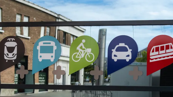 Sign with icons indicating access to multiple transportation modes in Le Havre, France
