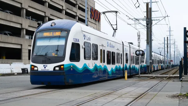 Bllue and white Link light rail train in Tukwila, Washington.