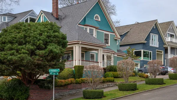 Teal and blue two-story houses in Seattle's historic Queen Anne neighborhood