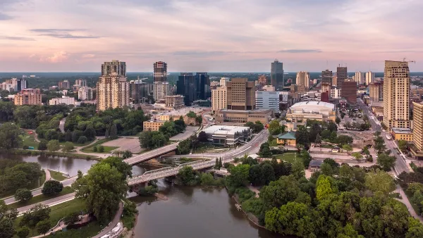 Aerial view of London, Ontario with river in foreground.