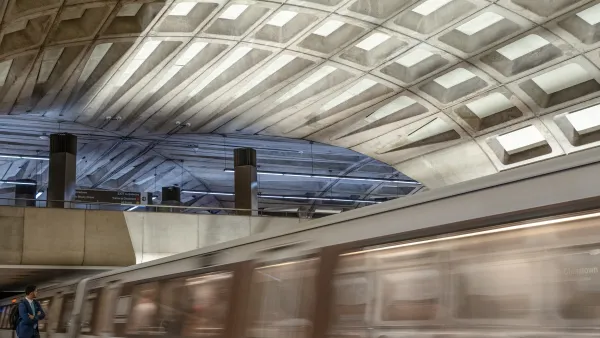 Blurred image of train passing by platform at Washington, D.C. undergroundtrain station