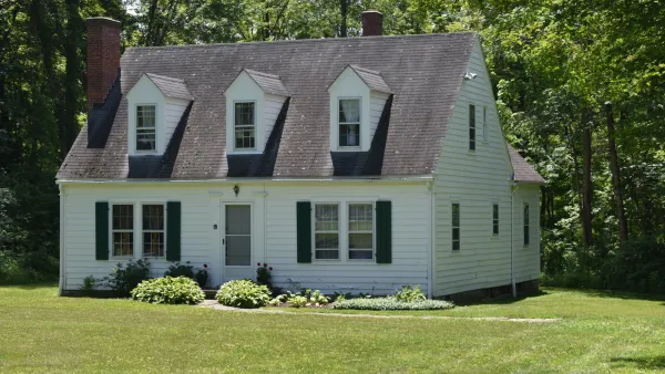 Craftsman-style white kit home from Sears catalog sold in early 20th century