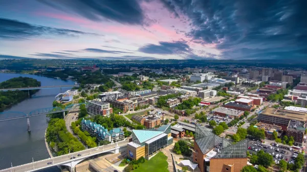 Aerial view of Chattanooga, Tennessee with a colorful sunset sky.