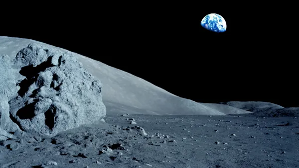 Gray moon surface with black sky and Earth in the background.