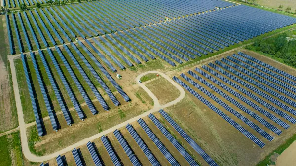 Aerial view of large solar panel installation in rural area in Indiana.