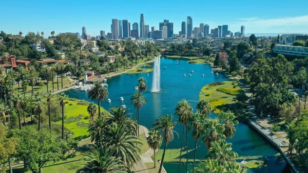 Downtown Los Angeles viewed from Echo Park with lake with artesian fountain in foreground.