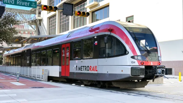 Red and silver MetroRail train in Austin, Texas.