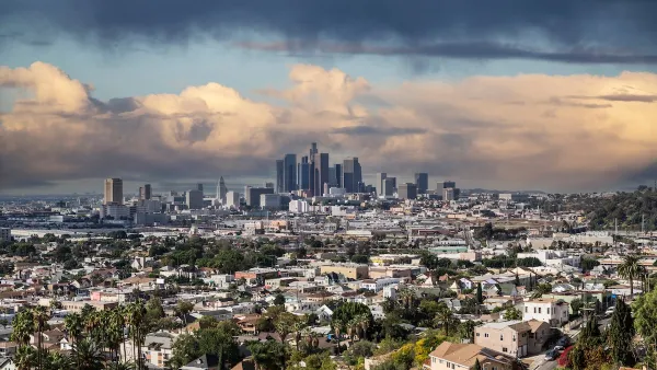 View from hilltop residential neighborhood of downtown Los Angeles, California on a cloudy day.
