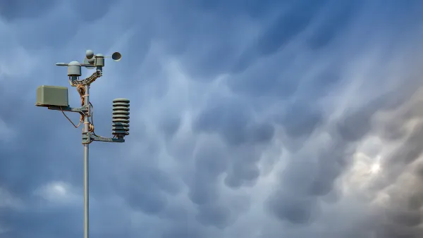 Weather station against stormy sky.
