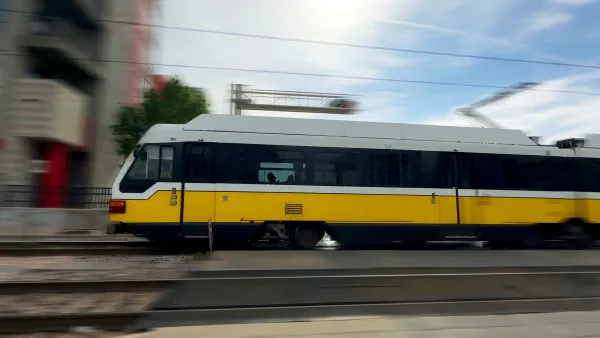 Blurred image of speeding DART light rain train in Dallas, Texas