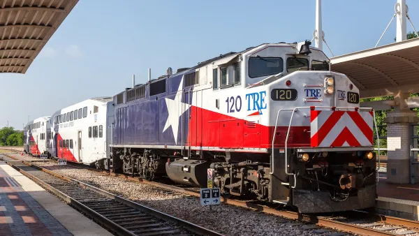Trinity Railway Express train painted with Texas flag at station in Dallas, Texas.