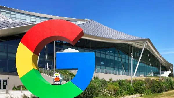 Large colorful letter G in front of Google campus building in Mountain View, California.