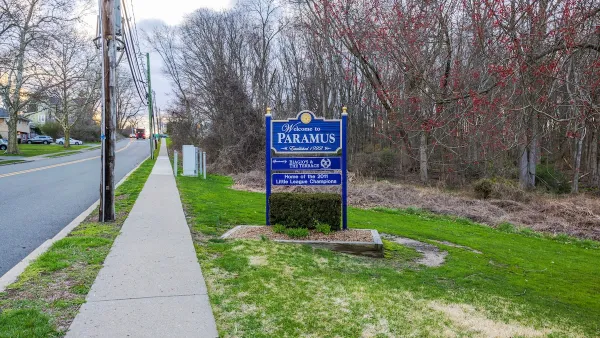 Blue and white Paramus, New Jersey town entrance sign.