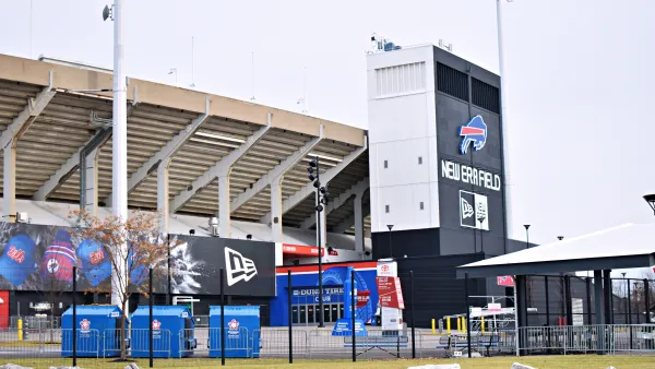 A football stadium, the home of the Buffalo Bills NFL team, is shown from the outside on a gloomy winter day.