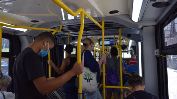 Bus riders wearing masks on a New York City bus