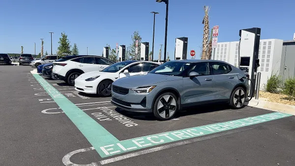 Electric car charging area in a parking lot at a Costco in Clermont, Florida.