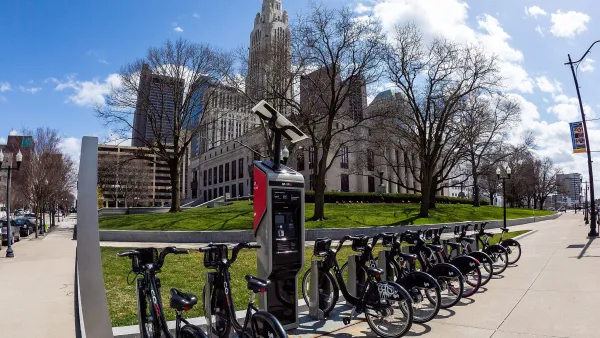 CoGo bike share station with black bikes in front of Columbus City Hall, Ohio