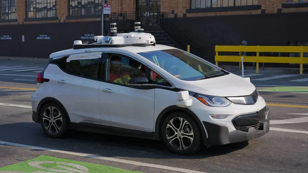 White Cruise autonomous vehicle on street in San Francisco, California.