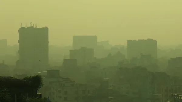 Air pollution is visible in the air around high-rise buildings in Dhaka, Bangladesh.