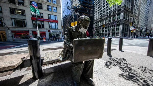 The sculpture of the "Double Check Businessman" in Liberty Park, New York City