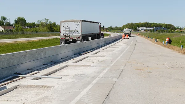 Construction work on highway segment in Indiana that will charge electric vehicles.