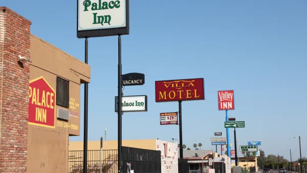 A row of motels on a wide street in Fresno, California
