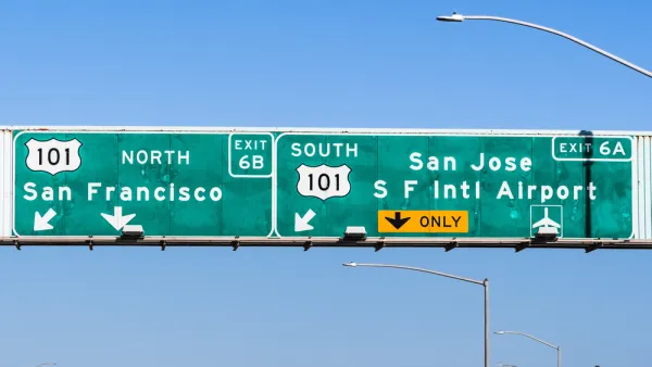 A highway sign reads with directions to reach San Francisco to the north and San Jose to the south--both on Highway 101.