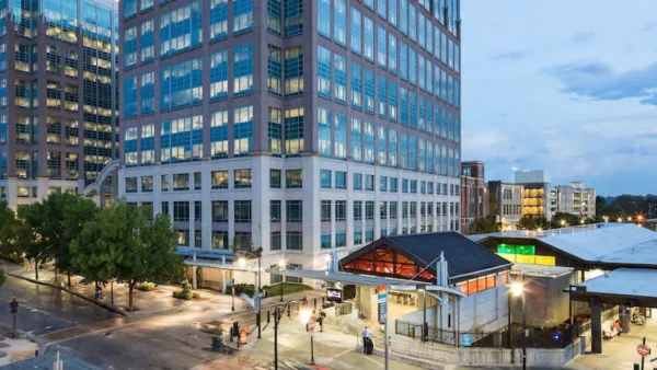 Rendering of TOD with two glass towers abovw MARTA transit station in Kensington near Atlanta, Georgia.