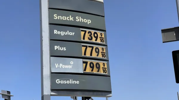 A sign with gas prices all listed above $7.39 per gallon.