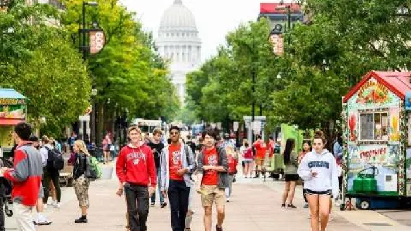 University of Wisconsin Madison students walking down LIbrary Mall pedestrian area in Madison, WI