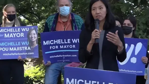 Michelle Wu campaigning for Mayor of Boston