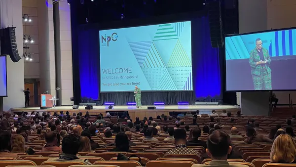 View of the stage, crowd, and speaker at the opening session of NPC24.