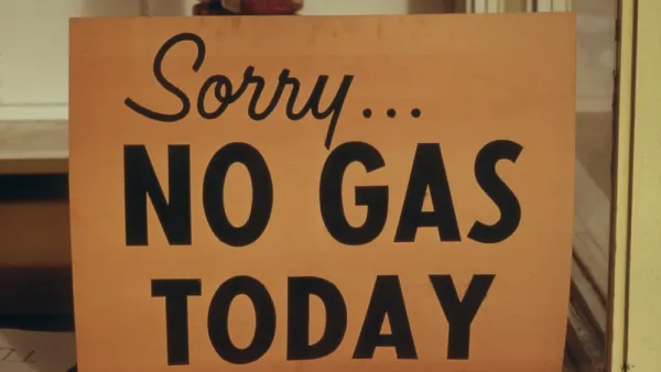 A sign reads “Sorry No Gas Today”.