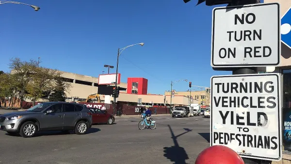 "No right turn on red" and "Turning vehicles yield to pedestrians" sign.