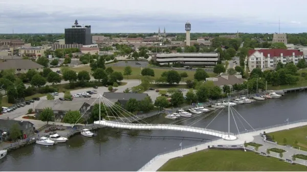 A conceptual rendering of a cable-stayed bicycle and pedestrian bridge over the Sheboygan River in Sheboygan, Wisconsin