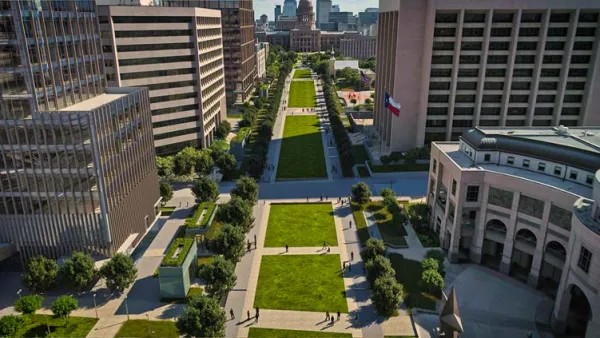 Rendering of Texas Mall with green lawns flanked by office towers and Capitol building at top