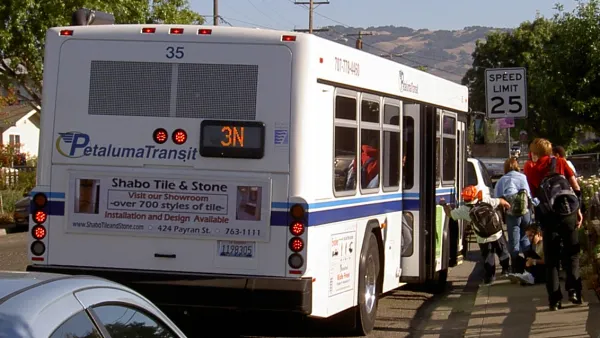 Passengers boarding a Petaluma Transit bus.