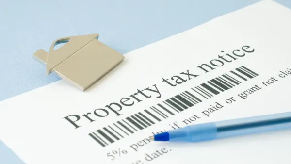 Property tax bill notice with pen