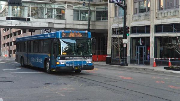 Blue Kansas City transit bus on Main Street, Kansas City, Missouri.