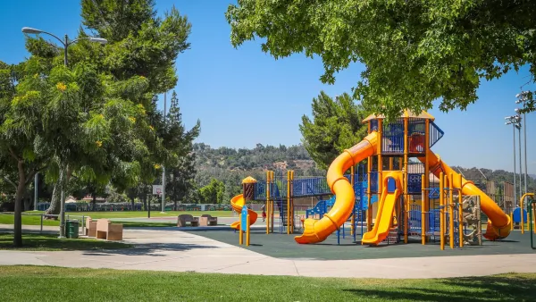 Playground with yellow slides in Rimgrove Park, Los Angeles County