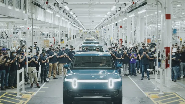 The first R1T built for a customer rolling off Rivian's assembly line at their plant in Normal, IL
