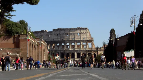 Colosseo in Rome as seen from Via dei Fori Imperiali on a Sunday when traffic is cut off.